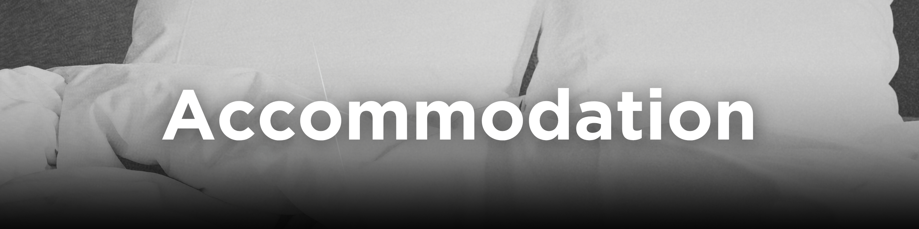 Text saying Accommodation over a picture of bedding